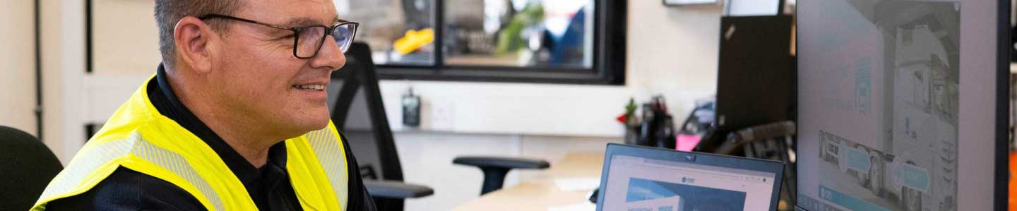 driver sitting at computer